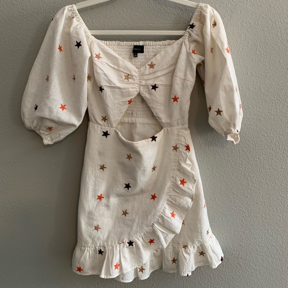 White dress with red & blue stars. Front cutout and side zipper. Fits like xs/s - Picture 4 of 7